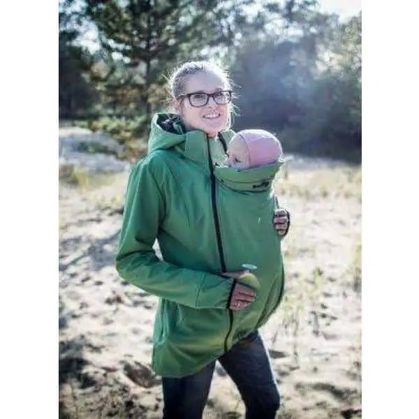 mother carrying her baby in winter with a green Angel Wings Softshell Jacket