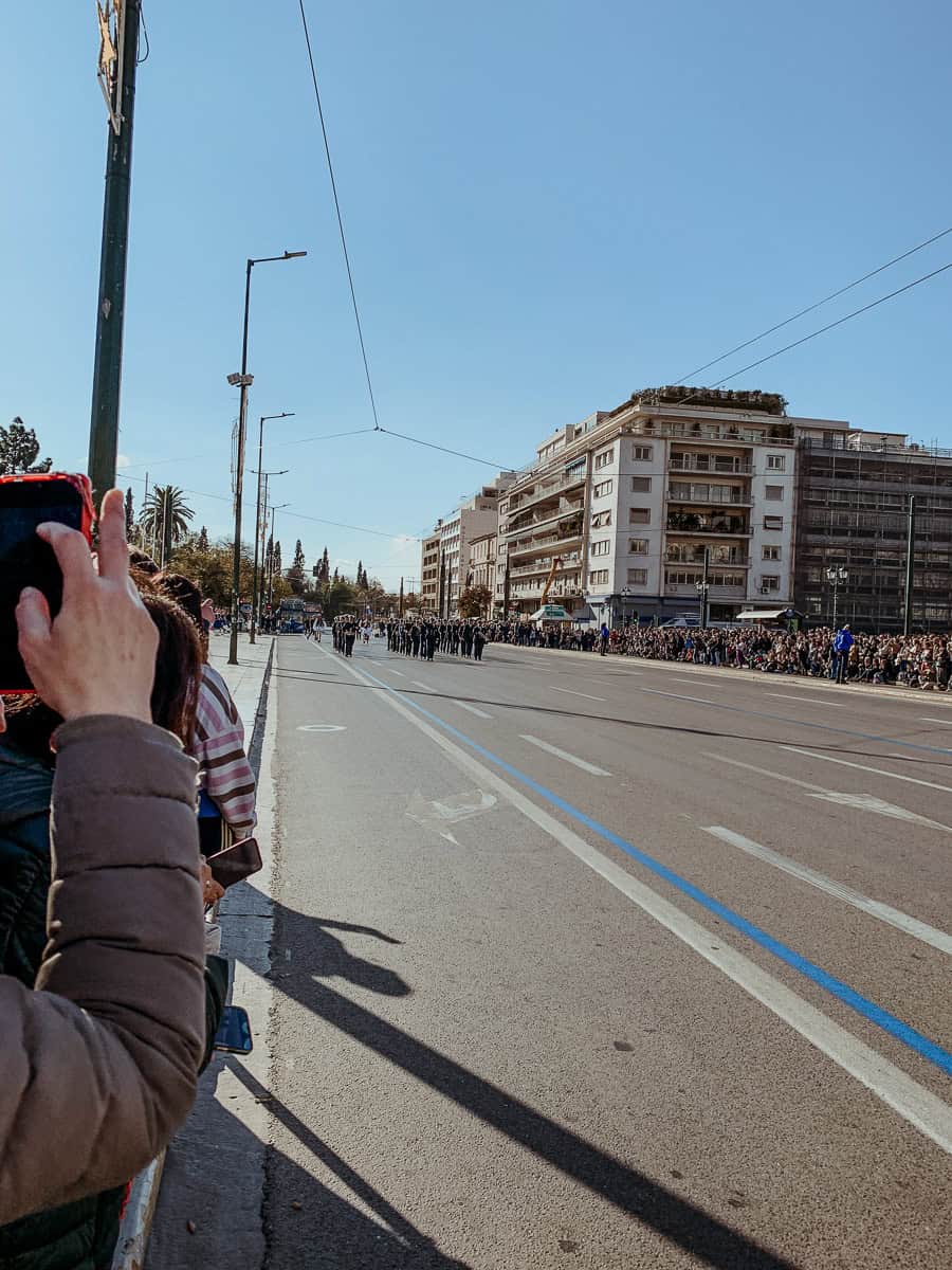 Together with a lot of people watching the brass band start to march after the ceremony.
