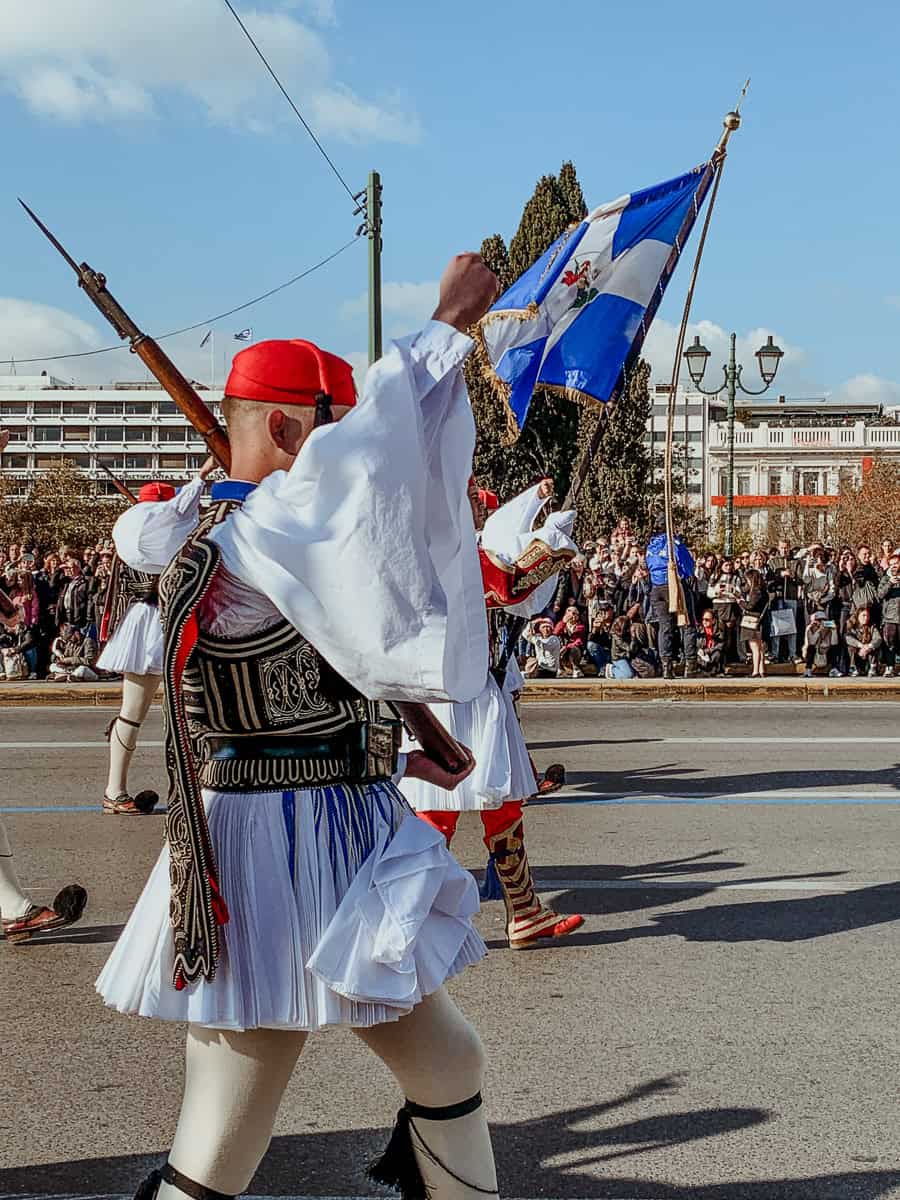 Evzones in close-up in their traditional outfits.