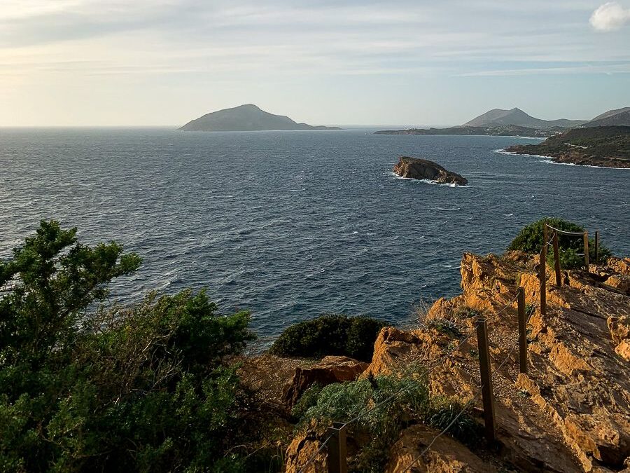Islands from afar under the blue skies and view of the cliff.