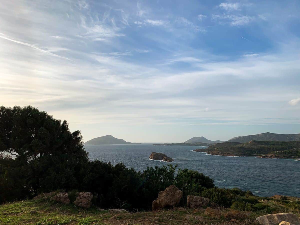 Islands from afar under the blue skies and view of the cliff.