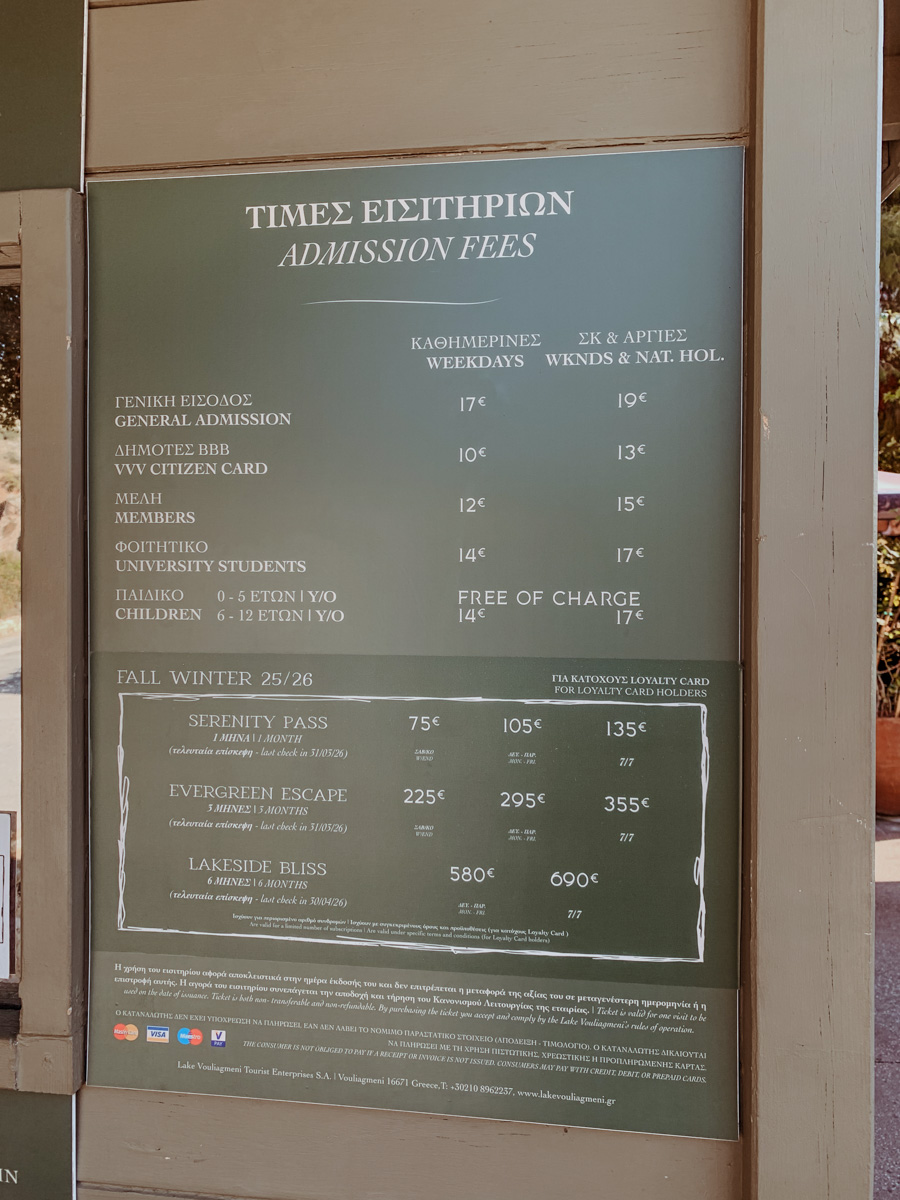 Price board in sage green at Lake Vouliagmeni.