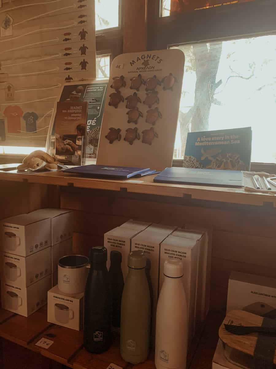 ARCHELON sea turtle merchandise, including turtle-shaped fridge magnets and souvenirs.